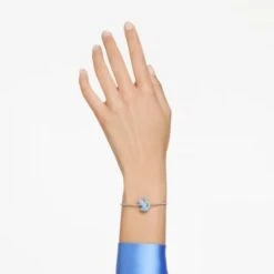 Swarovski Iconic Swan Bangle, Swan, Blue, Rhodium -Tissot || Longines || Omega Shop swarovski iconic swan bangle swan blue rhodium p60993 113617 image